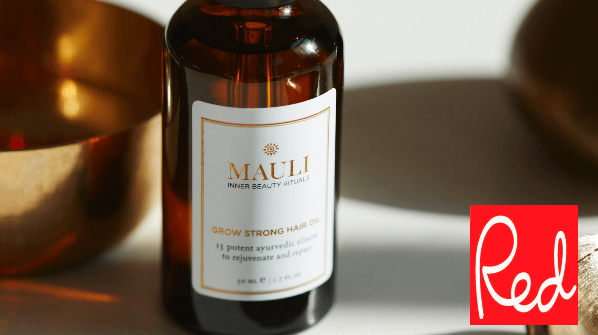 Grow Strong Hair Oil featured on Red Magazine online